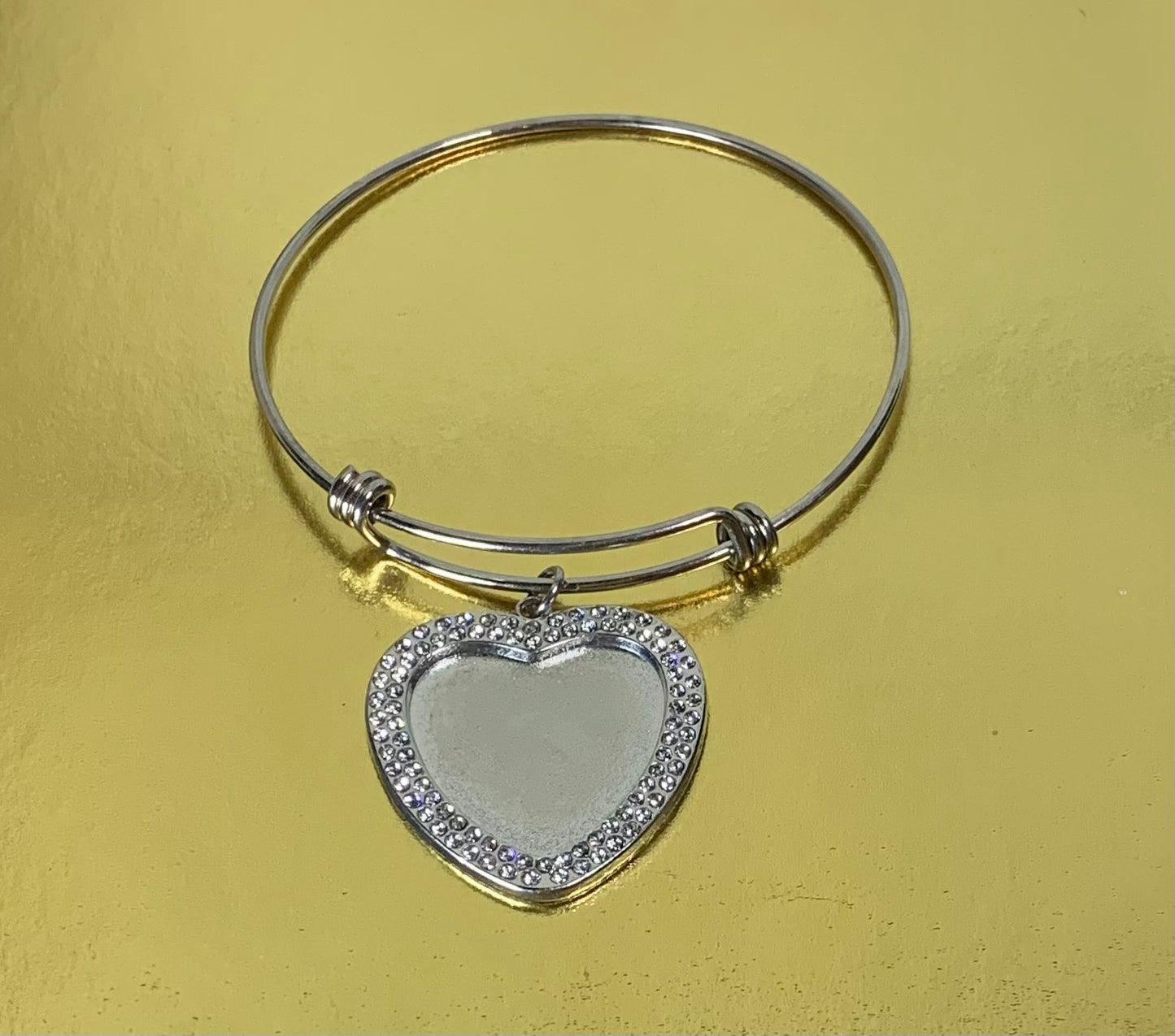 Adjustable bangle with heart photo charm
