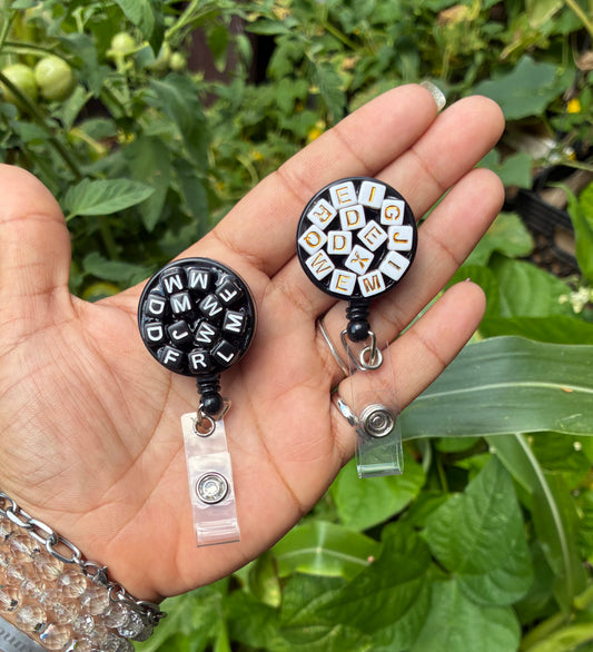 Alphabet badge reel