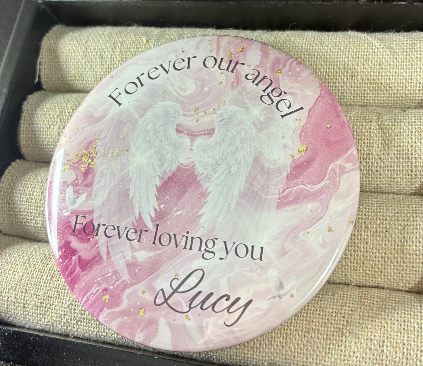 Pink and white memorial funeral button