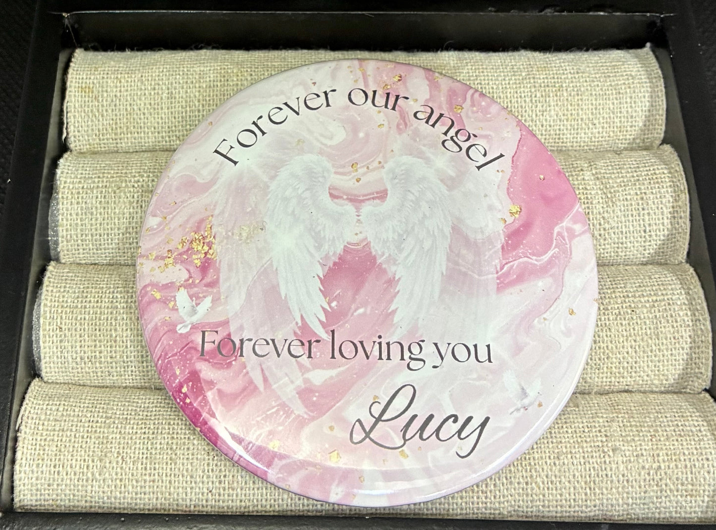 Pink and white memorial funeral button
