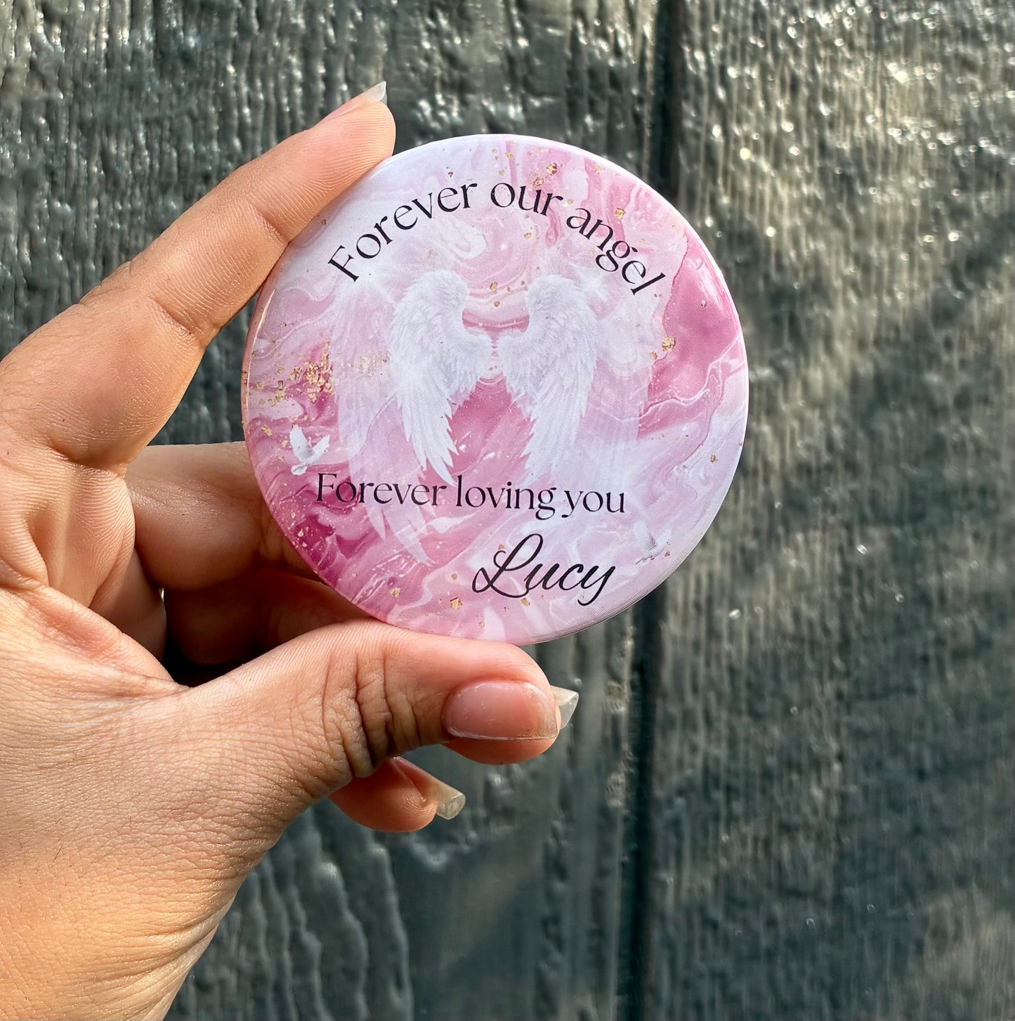 Pink and white memorial funeral button