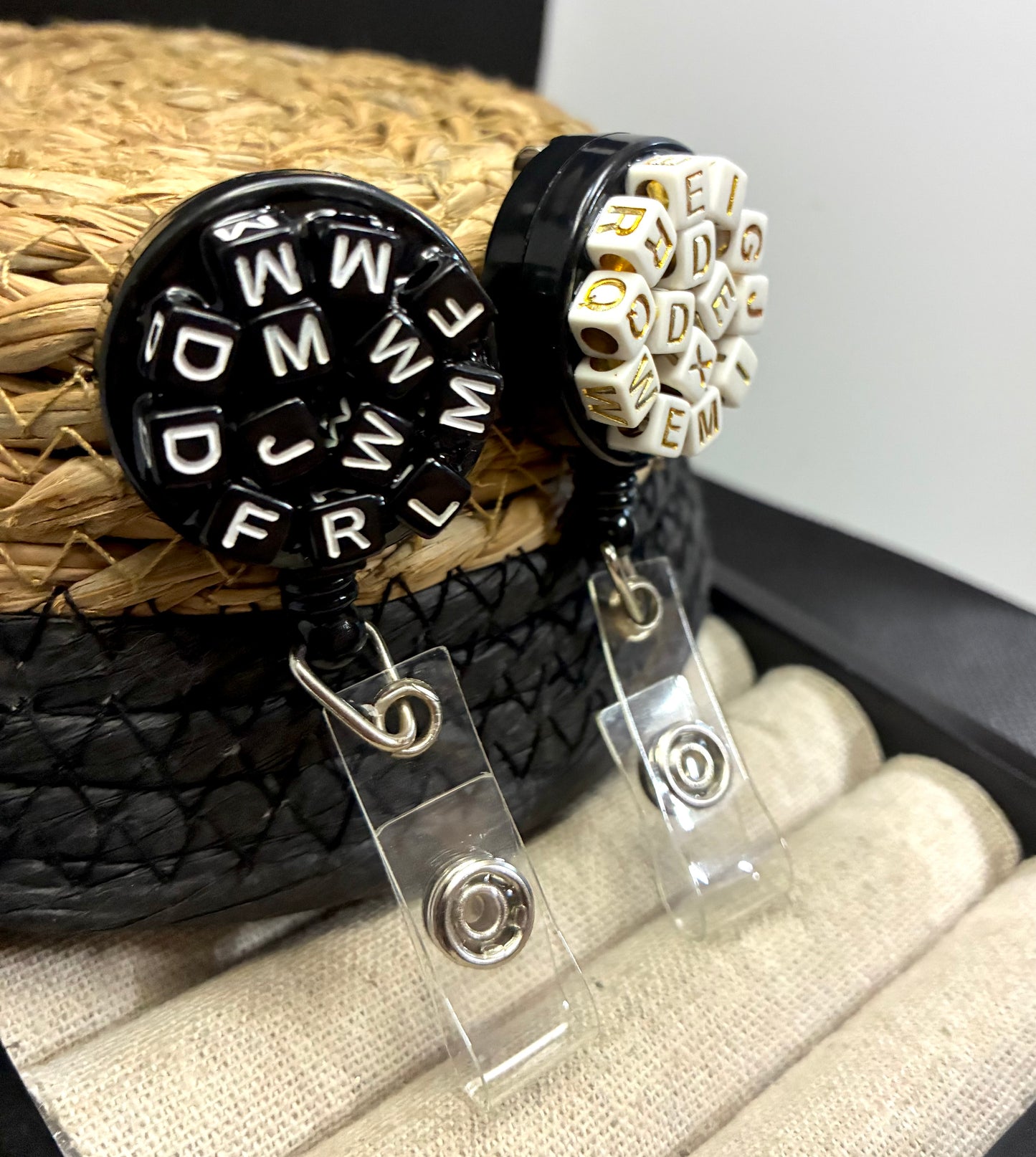 Alphabet badge reel